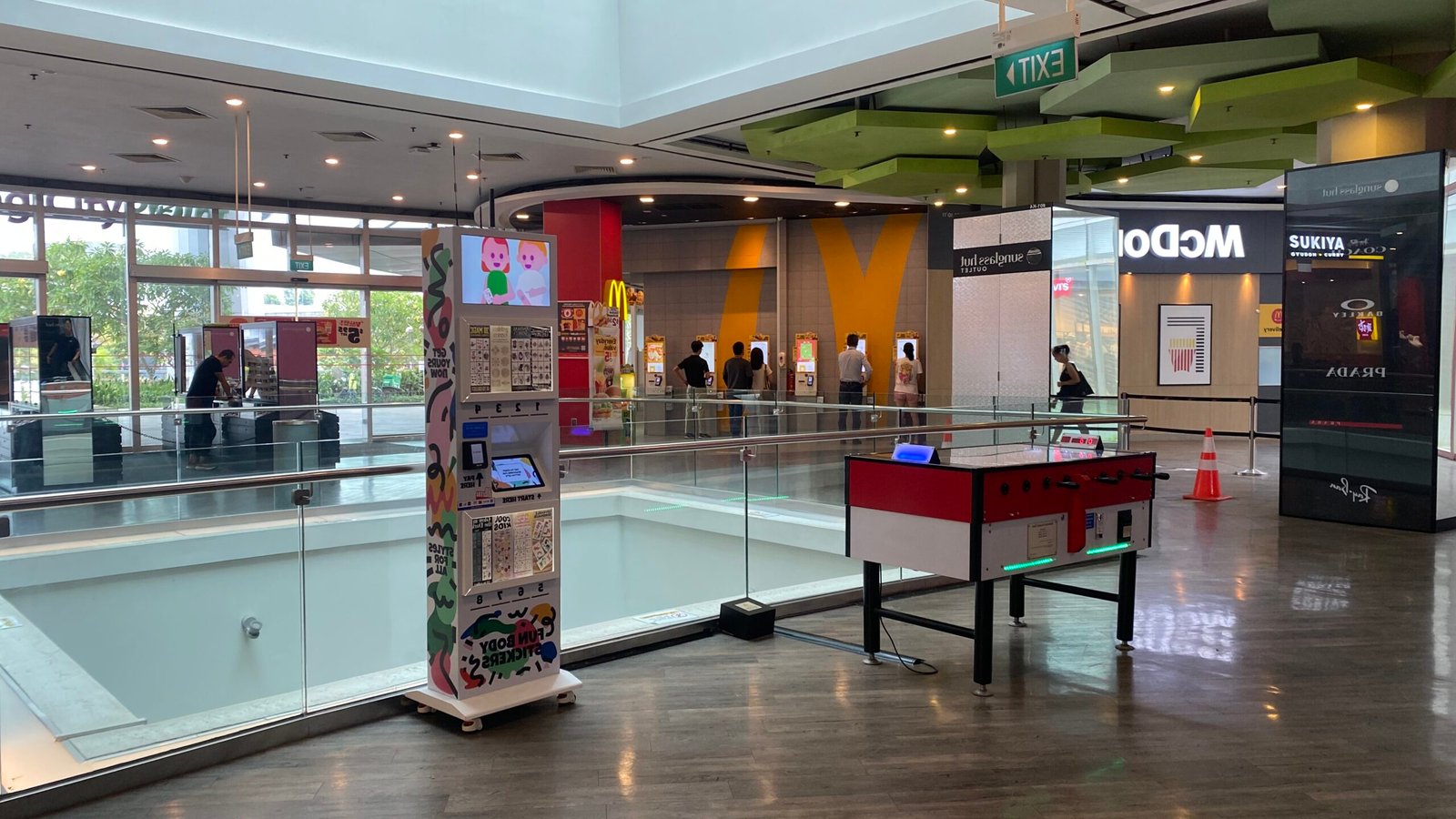 Tattoo vending machine in a theme park offering a selection of temporary tattoos for visitors looking for a fun