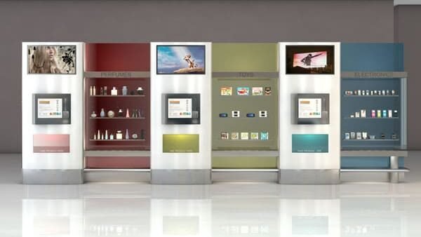 A modern perfume vending machines placed inside an airport duty-free shop